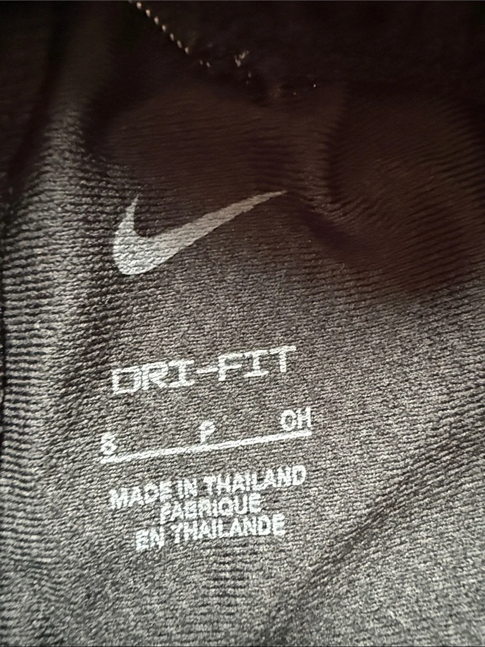 Nike Black Shorts with White Swoosh and Side Stripes